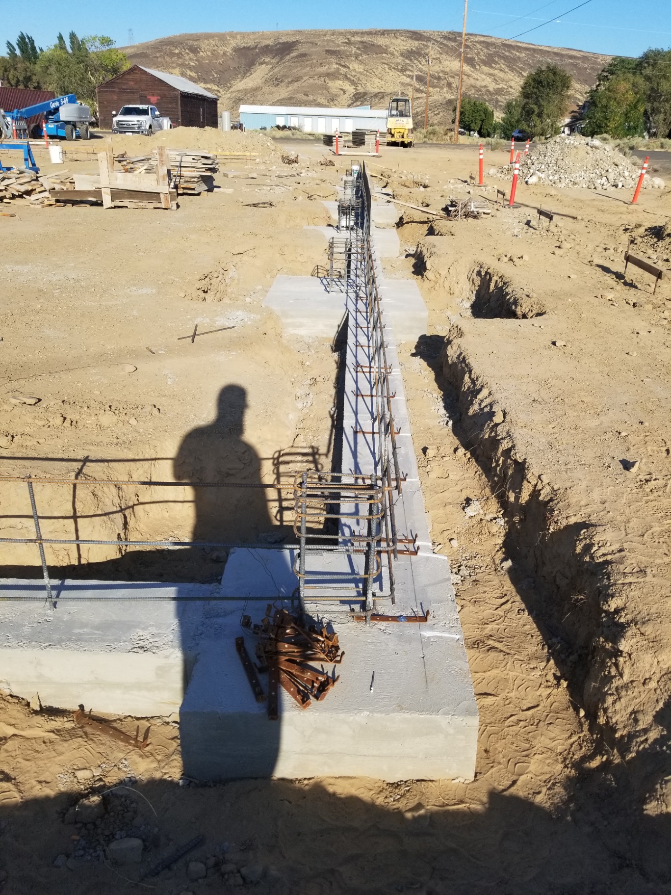 Continuous stem wall with anchor bolts and hold-downs