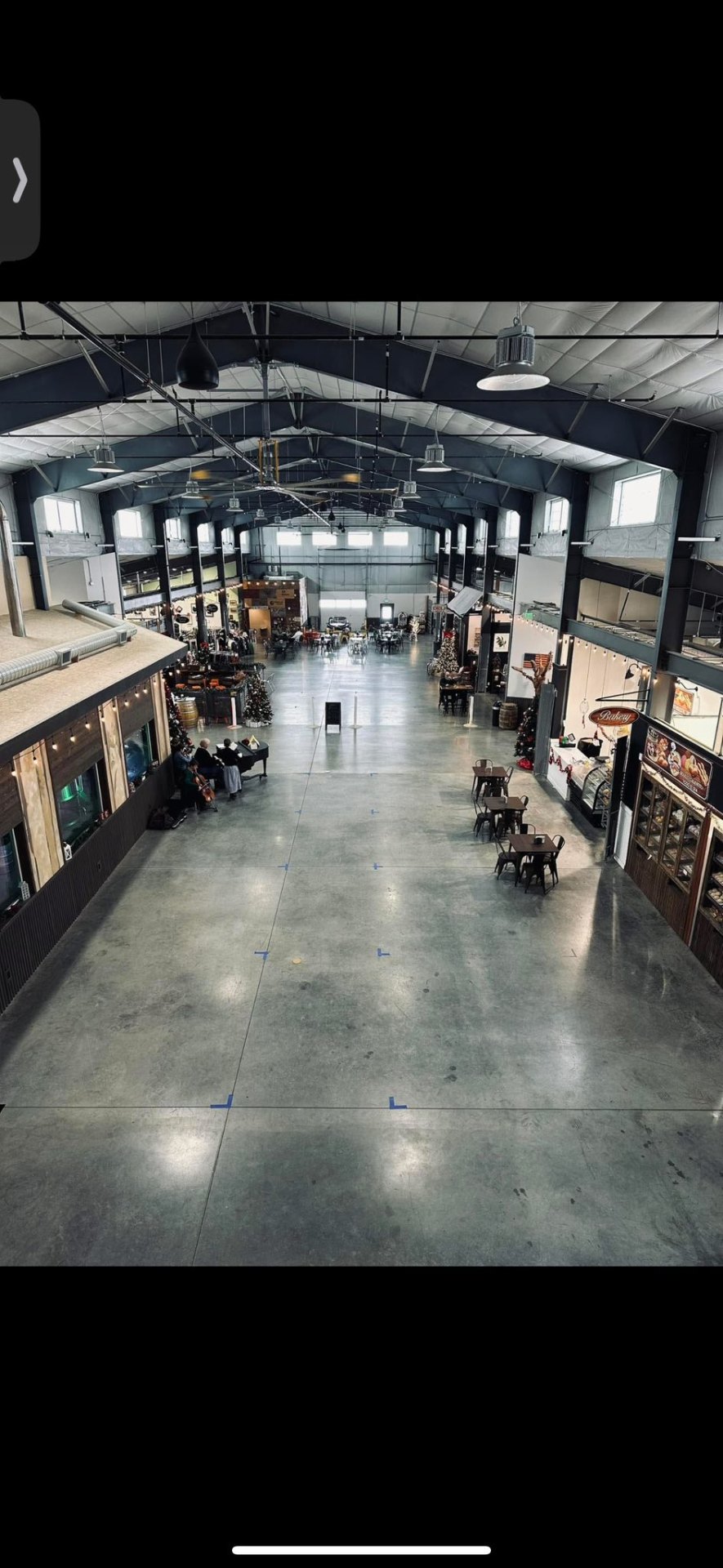 Quincy Public Market — elevated view down the length of the finished steel building interior